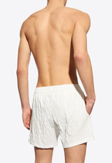 Embossed-Monogram Swim Shorts