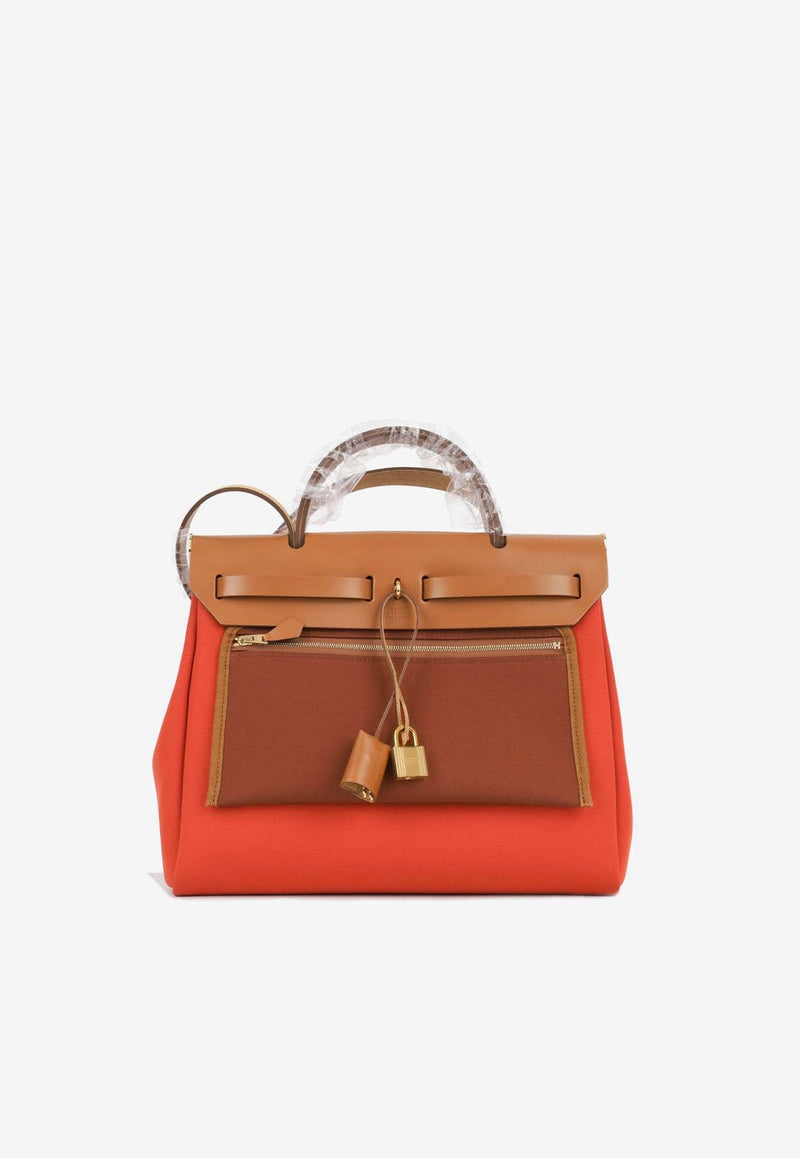 Herbag 31 in Orange Mecano, Cuivre Toile and Fauve Vache Hunter with Gold Hardware