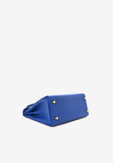 Kelly 25 Retourne in Bleu Royal Togo Leather with Gold Hardware