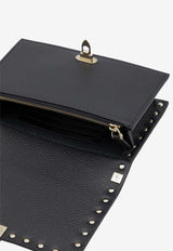 Small Rockstud Grained Leather Clutch Bag